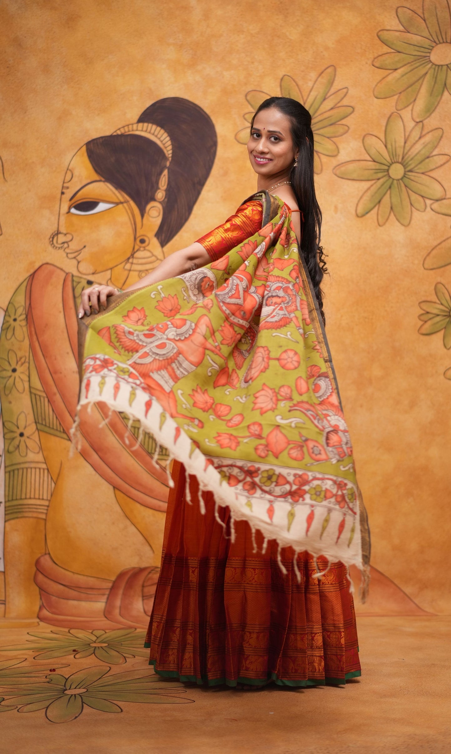 Orange halfsaree with Pen kalamkari duppata