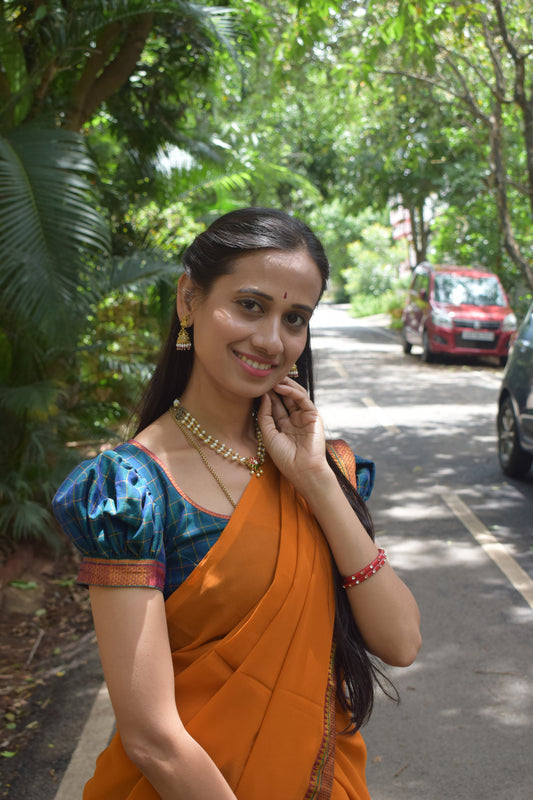green and orange halfsaree