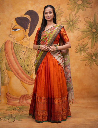 Orange halfsaree with Pen kalamkari duppata