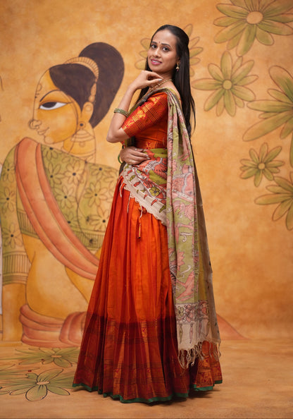 Orange halfsaree with Pen kalamkari duppata