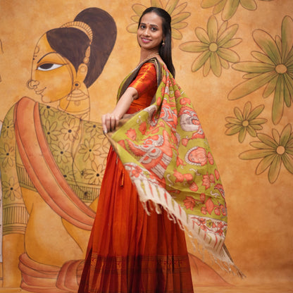 Orange halfsaree with Pen kalamkari duppata