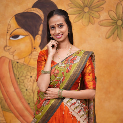 Orange halfsaree with Pen kalamkari duppata